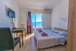 Postel nebo postele na pokoji v ubytování Apartment Goran
