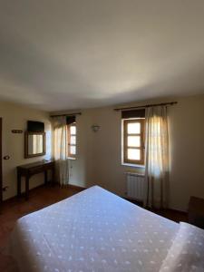 Postel nebo postele na pokoji v ubytování Casa rural osvilares