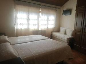 Postel nebo postele na pokoji v ubytování Casa rural osvilares