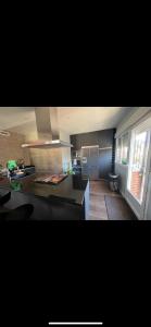 a kitchen with a sink and a counter top at Villa palmeras in Numancia de la Sagra