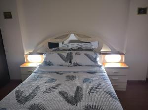 Ένα ή περισσότερα κρεβάτια σε δωμάτιο στο Encantadora habitación en Breña