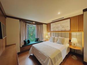 Postel nebo postele na pokoji v ubytování Presidencial Suite 3008 - Canela e Gramado