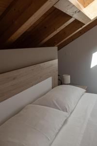 Postel nebo postele na pokoji v ubytování Affittacamere Bar Leo