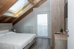 Postel nebo postele na pokoji v ubytování Affittacamere Bar Leo