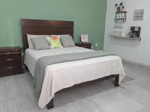 Ένα ή περισσότερα κρεβάτια σε δωμάτιο στο Estudio Biznaga