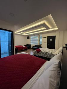 מיטה או מיטות בחדר ב-HOSTAL DEL RIO