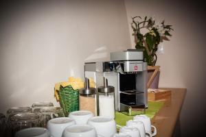 Příslušenství pro přípravu čaje a kávy v ubytování B&B Incanto