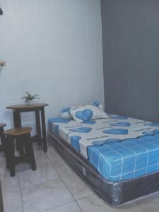 Postel nebo postele na pokoji v ubytování Kost Backpacker