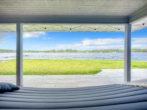 a porch with a view of a body of water at Trout River Oasis in Jacksonville