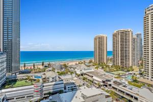 an aerial view of a city with the beach and buildings at H-Residences - Gclr in Gold Coast