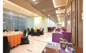 Χώρος καθιστικού στο Quest Hotel Simpang Lima - Semarang by ASTON