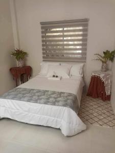 Ένα ή περισσότερα κρεβάτια σε δωμάτιο στο Casa doña elenita