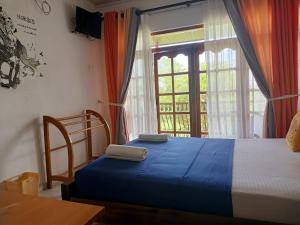 Postel nebo postele na pokoji v ubytování Andorra Tourist Resort Anuradhapura + 37 fotografií