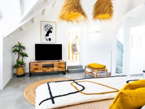 TV a/nebo společenská místnost v ubytování Studio Casa Sun