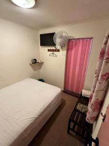 Postel nebo postele na pokoji v ubytování Hotel BB Inn @ Cameron
