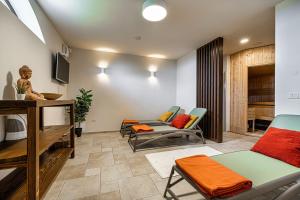 a living room with chairs and a table at Luxury Pool Villa Gradin - Happy Rentals in Gračišče