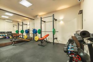 a gym with several equipment in a room at Luxury Pool Villa Gradin - Happy Rentals in Gračišče