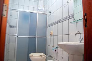 Koupelna v ubytování Pousada Emanuelli + 22 fotografií