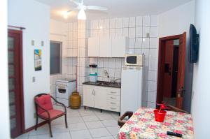 Kuchyň nebo kuchyňský kout v ubytování Pousada Emanuelli + 14 fotografií