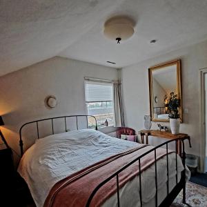 Postel nebo postele na pokoji v ubytování Carmen's Stay In - Jaagweg 13 - Ilpendam - 15 minuten naar Amsterdam met de bus + 9 fotografií