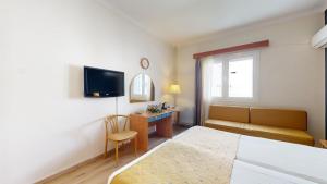 TV a/nebo společenská místnost v ubytování Lucy Hotel