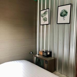 Yimwhan Hostel & Cafe Ayutthaya客房内的一张或多张床位