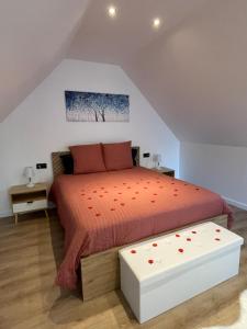 Ένα ή περισσότερα κρεβάτια σε δωμάτιο στο L’étang d’une pause