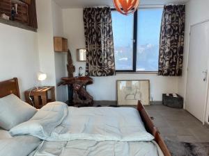 Postel nebo postele na pokoji v ubytování Loft by Conceptliving