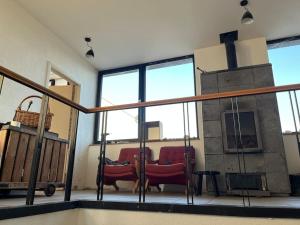 Posezení v ubytování Loft by Conceptliving