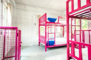 Postel nebo postele na pokoji v ubytování Slumber Party Koh Tao