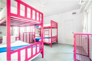 Postel nebo postele na pokoji v ubytování Slumber Party Koh Tao