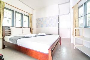 Postel nebo postele na pokoji v ubytování Slumber Party Koh Tao