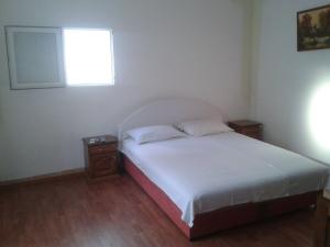 Postel nebo postele na pokoji v ubytování Guest House Vila Jasna