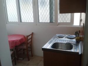 Kuchyň nebo kuchyňský kout v ubytování Guest House Vila Jasna