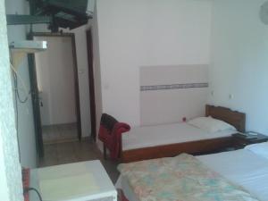 Postel nebo postele na pokoji v ubytování Guest House Vila Jasna