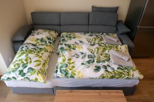Postel nebo postele na pokoji v ubytování Apartmány Family Nová Lesná