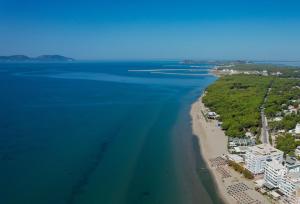 an aerial view of a beach and the ocean at Sea & Sand Hotel in Vlorë