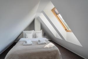 Posteľ alebo postele v izbe v ubytovaní Harenda Residence - Destigo Hotels