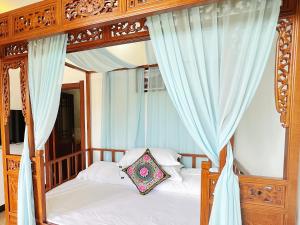 Giường trong phòng chung tại 372 Jingjing Home