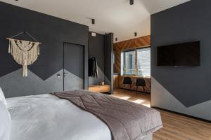 Rúm í herbergi á Didukh Eco Hotel&Spa