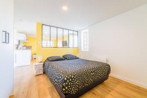 Postel nebo postele na pokoji v ubytování Les chevrefeuilles Appartement en residence + 27 fotografií