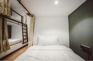 Postel nebo postele na pokoji v ubytování DANG HOSTEL