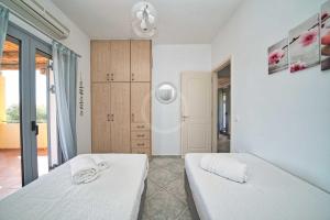 Postel nebo postele na pokoji v ubytování Villa Clementine