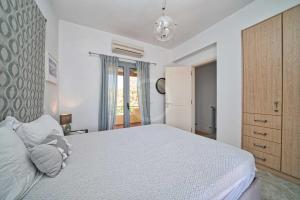 Postel nebo postele na pokoji v ubytování Villa Clementine