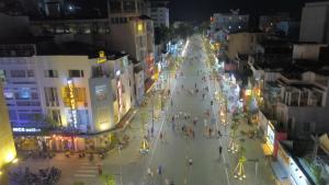 an overhead view of a city street at night at Nice Hue Hotel in Hue