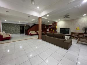 TV a/nebo společenská místnost v ubytování Shangrila House @ 香格里拉民宿