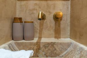 Koupelna v ubytování Manus Dei Exclusive Suites