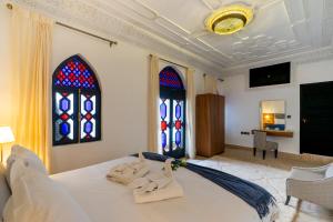 Postel nebo postele na pokoji v ubytování The Grand Riad and Spa