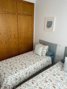 Posteľ alebo postele v izbe v ubytovaní Casa Aloe
