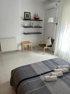Posteľ alebo postele v izbe v ubytovaní Casa Aloe